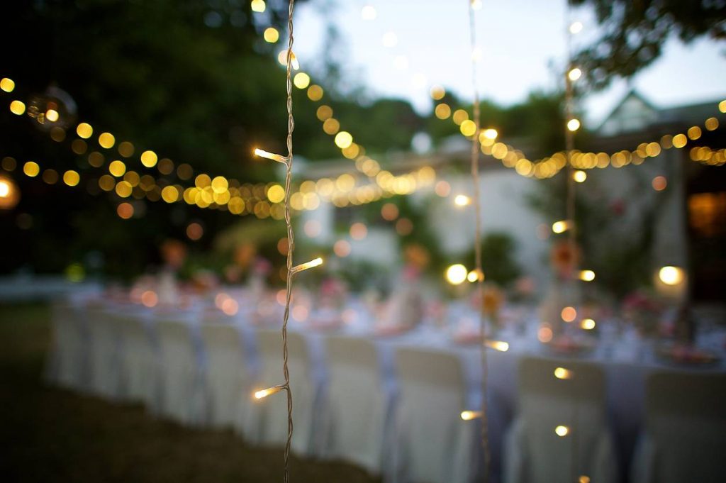 Wedding String Lights in focus at dusk